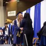 Photo courtesy Destiny Booth
Soldotna High School early graduate Lucy Uhlir receives her diploma during a commencement ceremony on Monday, May 18, at the Soldotna Regional Sports Complex.