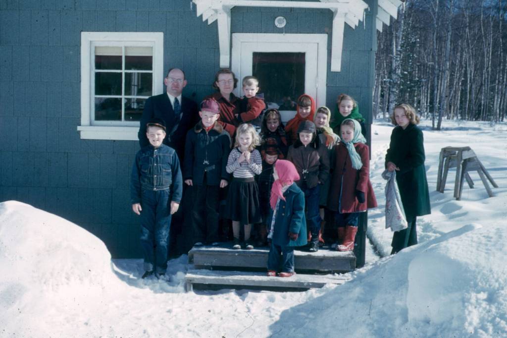 The Rev. Eugene Elliott poses with a portion of his Soldotna Methodist flock in 1952. (Photo from the Kenai Peninsula College photo archive)