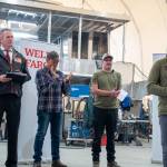 Governor Mike Dunleavy joins Mike Rowe, Bay Weld employee Kele Bottineau and Bay Weld Boats owner and CEO Eric Engebretsen in Homer July 23 as Wells Fargo provided $250,000 for the Alaska Vocational and Technical Center. (Courtesy of Wells Fargo)